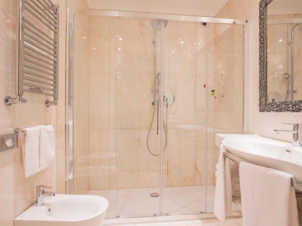 Hotel San Pietro : photo 9 de la chambre chambre triple deluxe