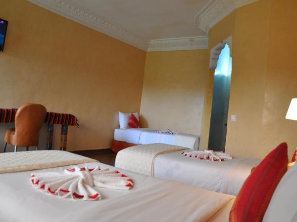 Riad Hamdani : photo 2 de la chambre chambre triple - vue sur jardin