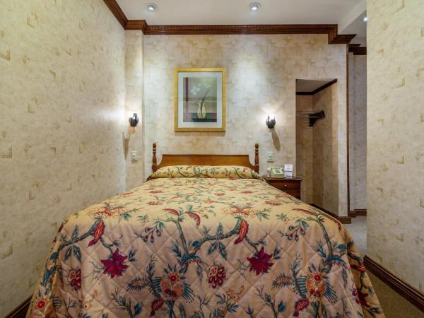 Hotel 31 Extended Stay : photo 1 de la chambre chambre double avec salle de bains commune