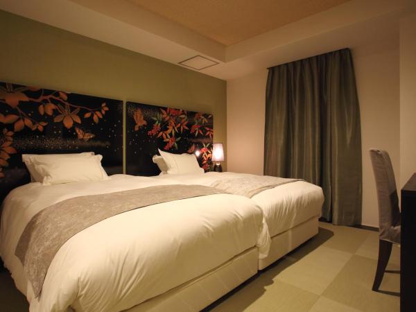 Centurion Hotel Grand Kobe Station : photo 1 de la chambre chambre lits jumeaux avec sol en tatami - non-fumeurs