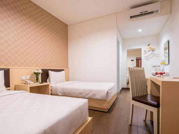 Hotel 88 Grogol Jakarta By WH : photo 1 de la chambre chambre lits jumeaux deluxe