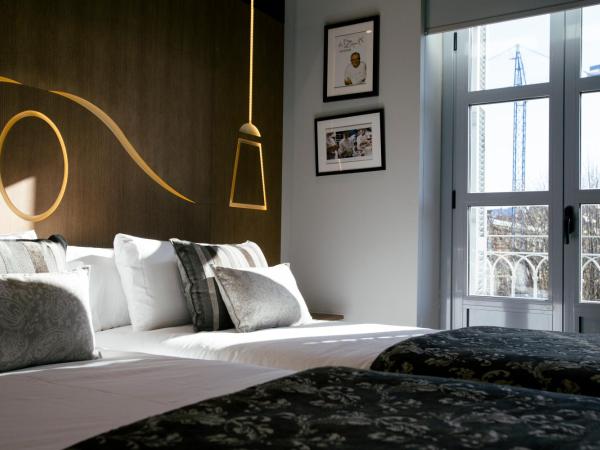 Legazpi Doce Rooms & Suites : photo 3 de la chambre appartement 1 chambre avec balcon