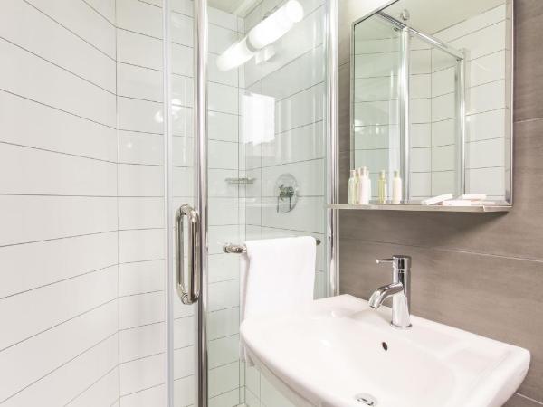 Travelodge by Wyndham Montreal Centre : photo 3 de la chambre chambre triple avec 3 lits simples - non-fumeurs