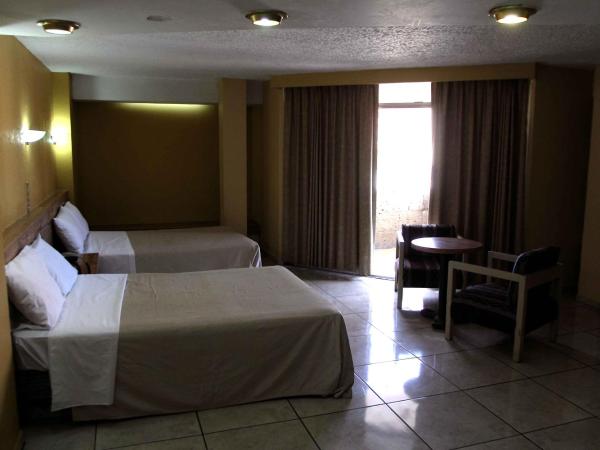 Hotel Universo : photo 2 de la chambre suite avec 2 lits doubles