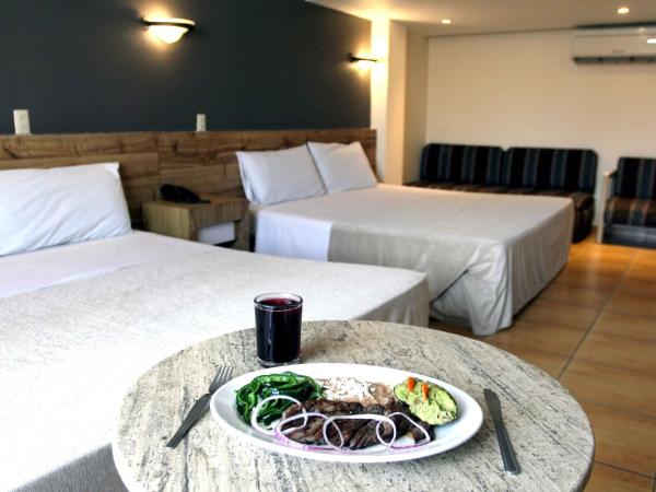 Hotel Universo : photo 4 de la chambre suite k avec 2 lits king-size