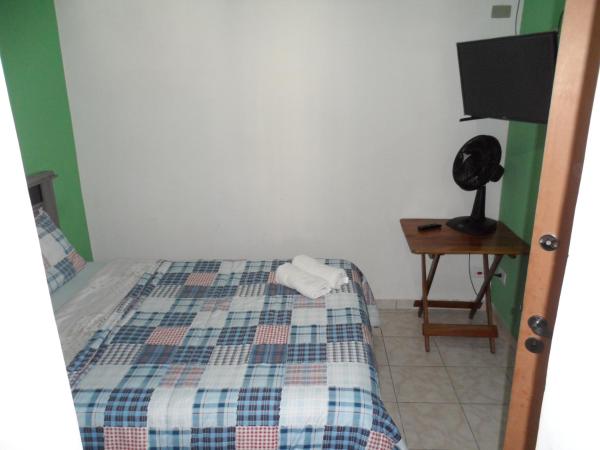 Hospedagem Henri Dunant : photo 3 de la chambre chambre triple
