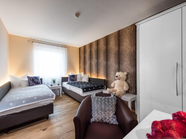 Hotel dasMEI : photo 3 de la chambre chambre familiale - schäfchenwolke