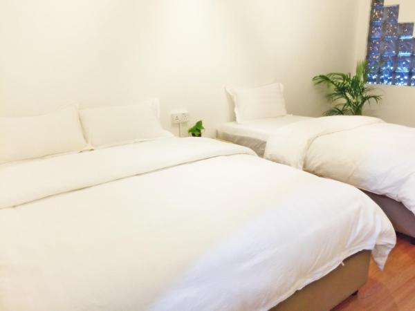 The Gatherings Place : photo 3 de la chambre chambre triple - vue sur ville