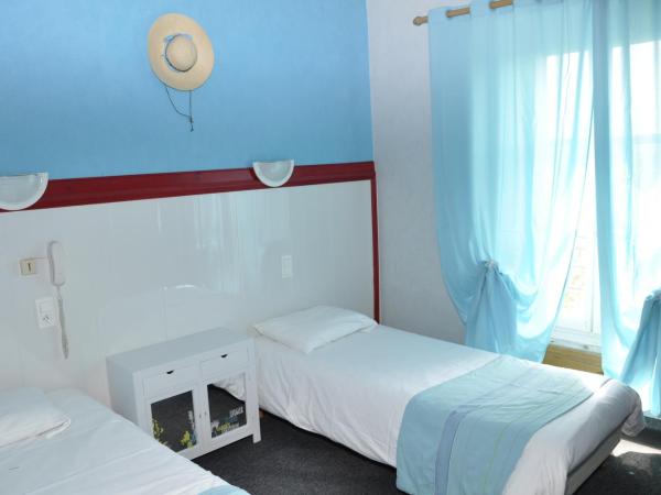 Citotel Hôtel Cesar : photo 5 de la chambre chambre lits jumeaux