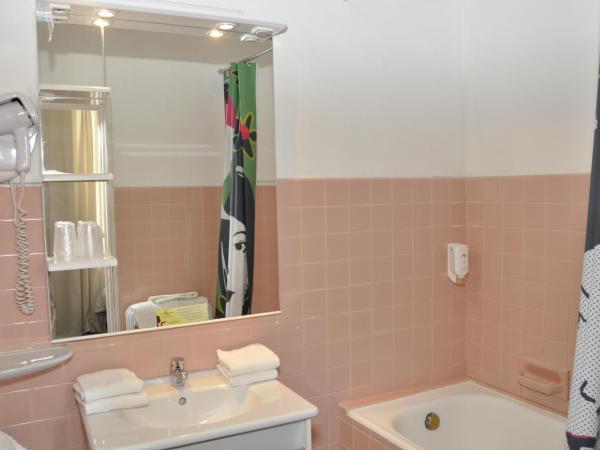 Citotel Hôtel Cesar : photo 7 de la chambre chambre lits jumeaux