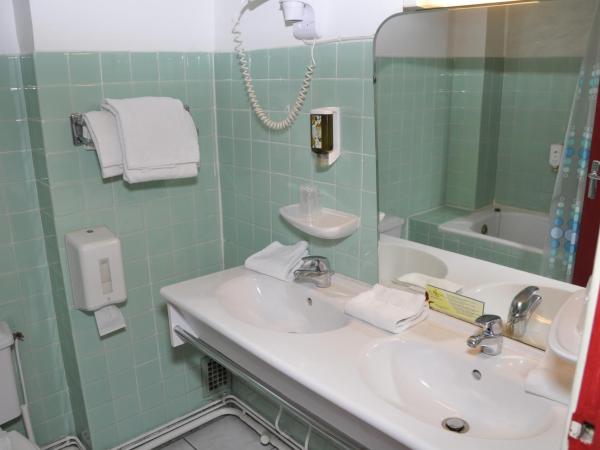 Citotel Hôtel Cesar : photo 7 de la chambre chambre triple familiale