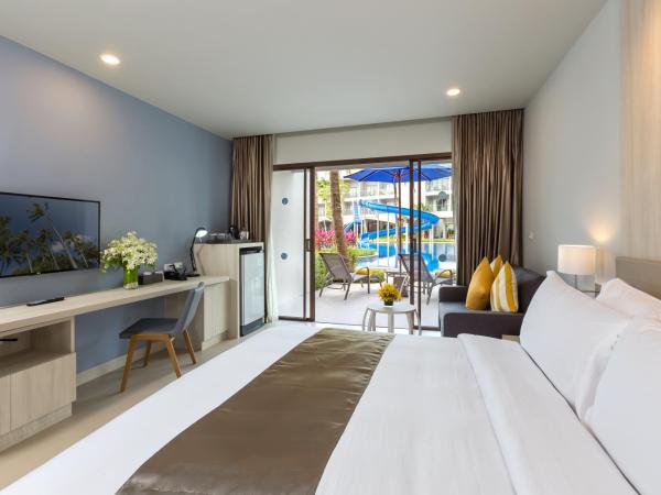 X10 Khaolak Resort : photo 6 de la chambre chambre double ou lits jumeaux de luxe - accès à la piscine - aile plage