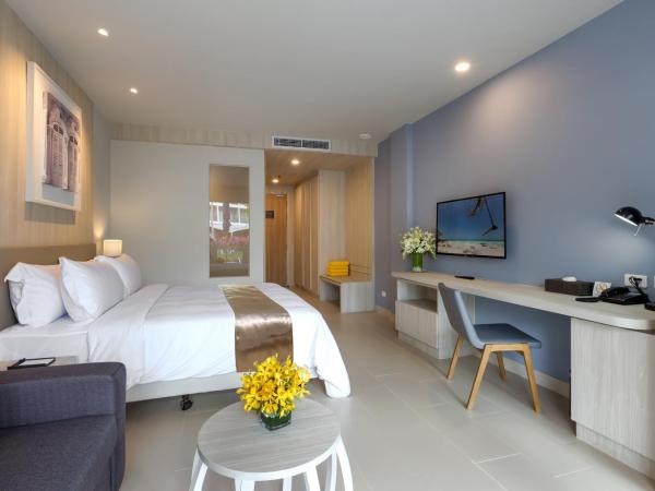 X10 Khaolak Resort : photo 4 de la chambre chambre double ou lits jumeaux de luxe - accès à la piscine - aile plage