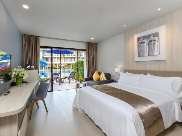 X10 Khaolak Resort : photo 2 de la chambre chambre double ou lits jumeaux de luxe - accès à la piscine - aile plage