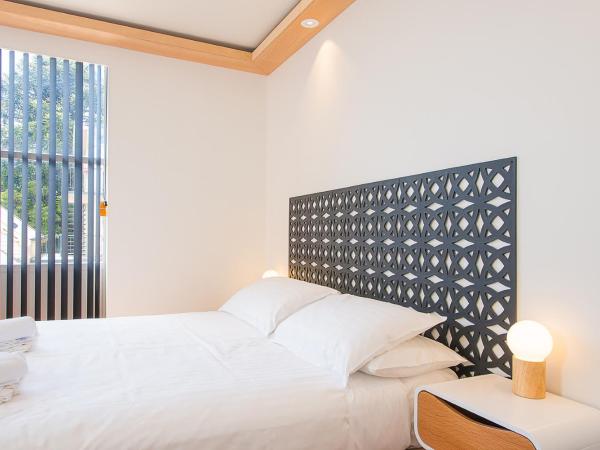 Blue Hills Motel : photo 2 de la chambre chambre lit queen-size