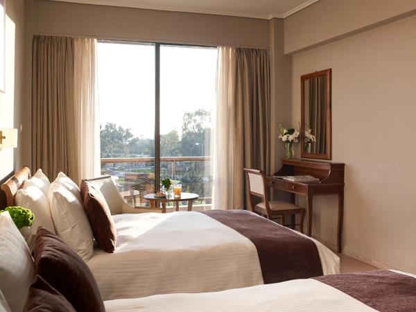 Golden Sun Hotel : photo 3 de la chambre chambre double ou lits jumeaux