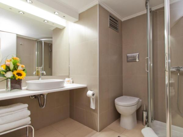 Golden Sun Hotel : photo 2 de la chambre chambre triple