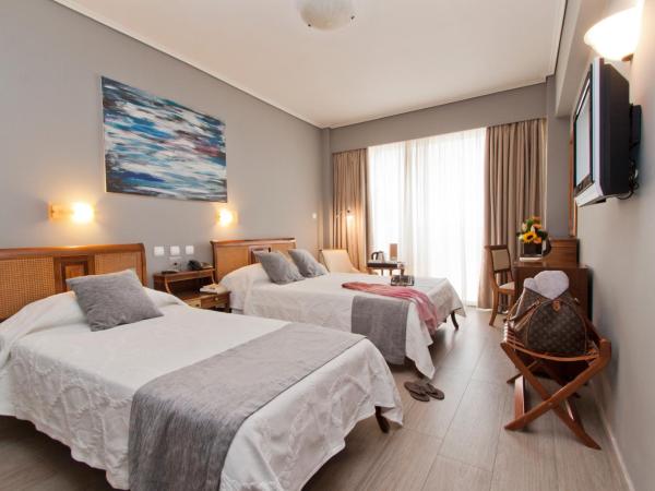 Golden Sun Hotel : photo 5 de la chambre chambre triple