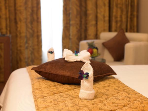 Blu Petal - A Business Hotel : photo 3 de la chambre chambre lit king-size