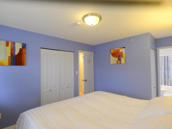 Marpole Guest House : photo 1 de la chambre chambre lit king-size deluxe