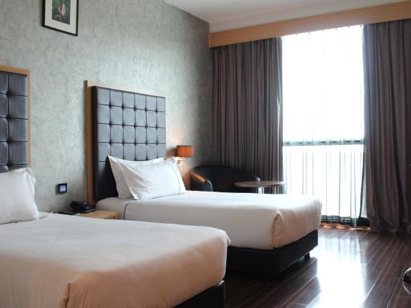 Symphony Suites Hotel : photo 1 de la chambre chambre lits jumeaux supérieure