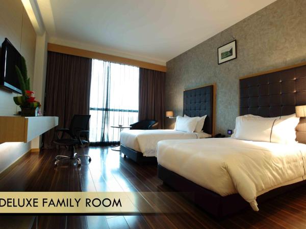 Symphony Suites Hotel : photo 1 de la chambre chambre familiale