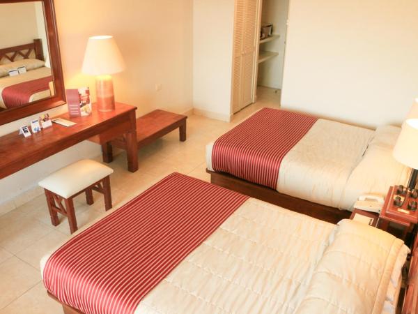 Hotel Fortin Plaza : photo 4 de la chambre chambre double avec 2 lits doubles