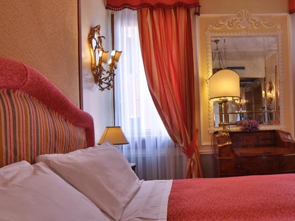 Hotel Arlecchino : photo 1 de la chambre chambre triple
