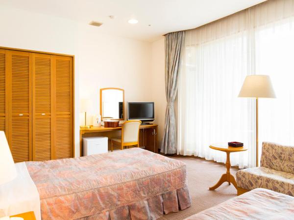 Kobe Hotel Fruit Flower : photo 4 de la chambre chambre lits jumeaux avec lit d’appoint - 301