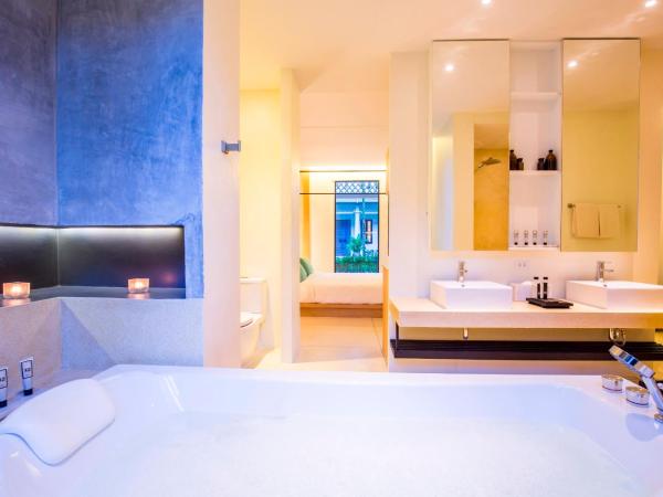 The Anda Mani Khaolak Beachfront Villas : photo 9 de la chambre suite avec baignoire spa