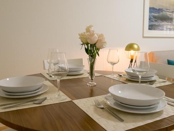 Simon Guest Apartments : photo 1 de la chambre grande chambre double ou lits jumeaux