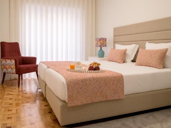 Simon Guest Apartments : photo 3 de la chambre grande chambre double ou lits jumeaux