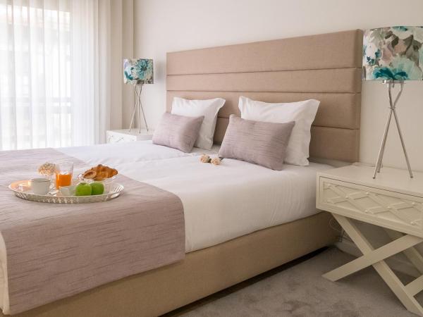 Simon Guest Apartments : photo 6 de la chambre grande chambre double ou lits jumeaux