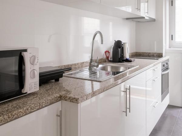 Simon Guest Apartments : photo 6 de la chambre chambre double ou lits jumeaux