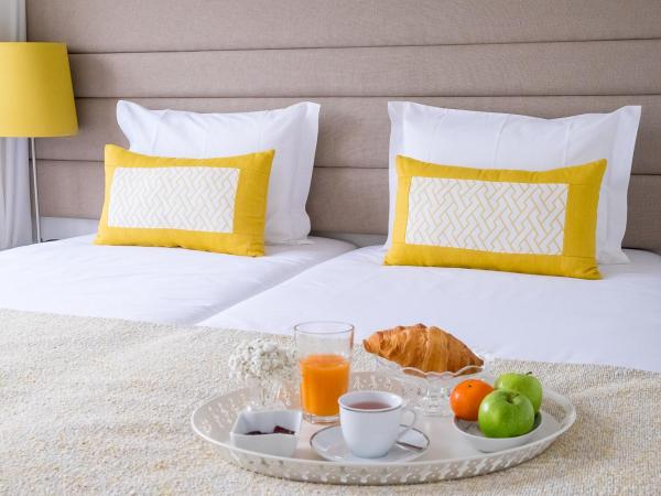 Simon Guest Apartments : photo 5 de la chambre chambre double ou lits jumeaux avec terrasse