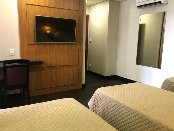Hotel Grand Barão : photo 4 de la chambre chambre lits jumeaux