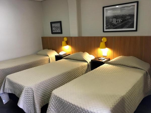 Hotel Grand Barão : photo 5 de la chambre chambre triple