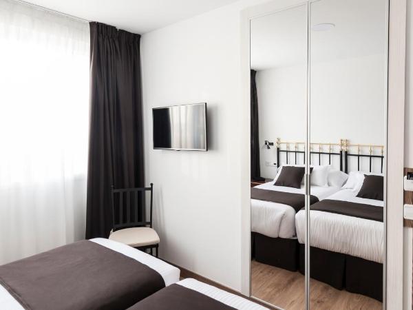 Suite Home Sardinero : photo 4 de la chambre chambre double ou lits jumeaux