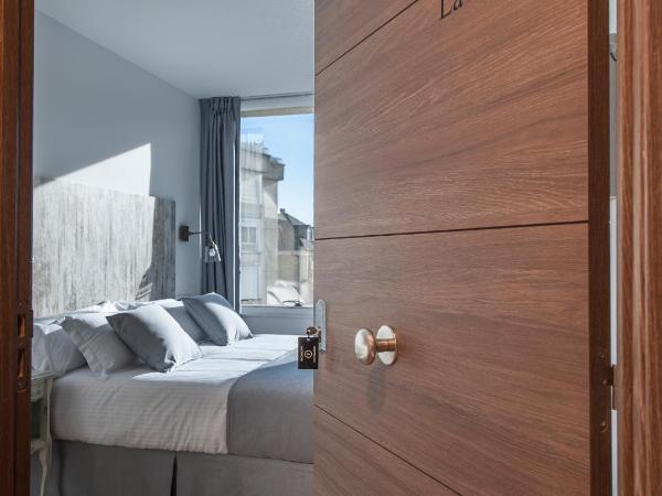 Suite Home Sardinero : photo 3 de la chambre chambre standard lit queen-size