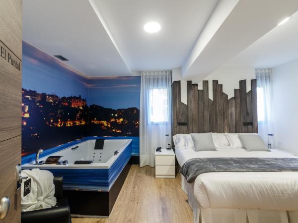 Suite Home Sardinero : photo 1 de la chambre chambre de luxe double ou lits jumeaux avec baignoire spa