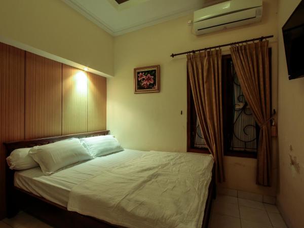 Griya Langen Guesthouse : photo 10 de la chambre maison 4 chambres