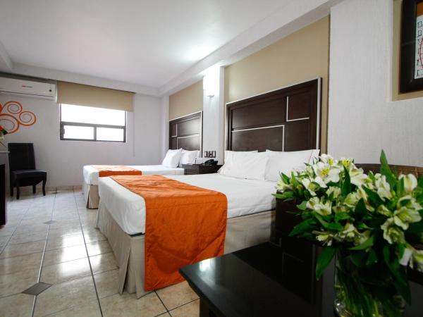 Hotel Estadio : photo 1 de la chambre chambre de luxe avec 2 lits queen-size.