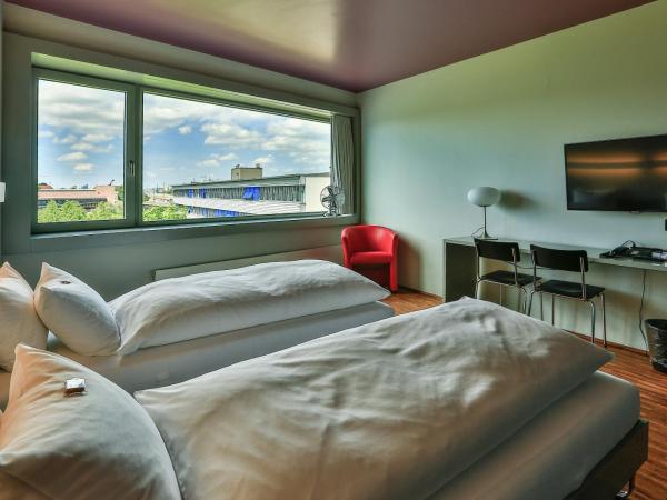 Dasbreitehotel am Rhein : photo 3 de la chambre chambre lits jumeaux design