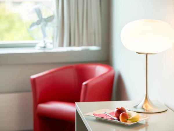 Dasbreitehotel am Rhein : photo 4 de la chambre chambre lits jumeaux design