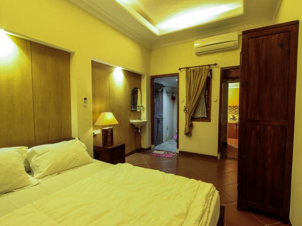 Griya Langen Guesthouse : photo 9 de la chambre chambre double - vue sur parc