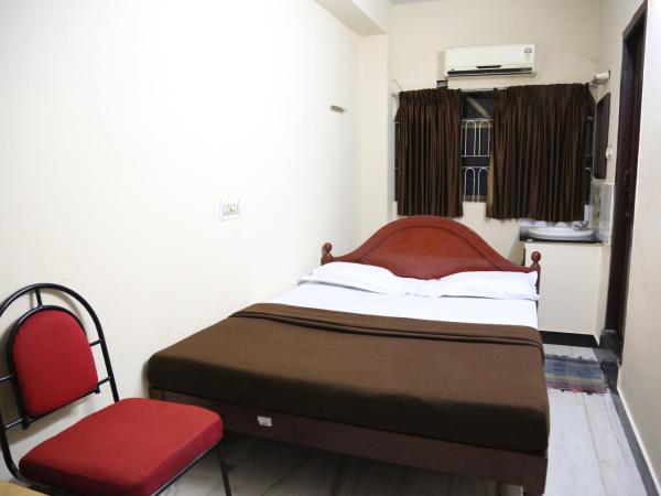 Rmc travellers inn : photo 1 de la chambre chambre simple deluxe