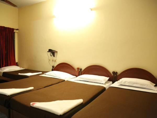 Rmc travellers inn : photo 1 de la chambre chambre quadruple confort