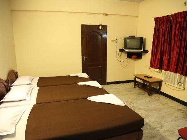 Rmc travellers inn : photo 2 de la chambre chambre quadruple confort