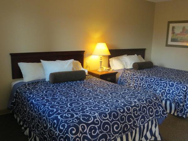 Astro Best Inn : photo 1 de la chambre chambre avec 2 grands lits queen-size 