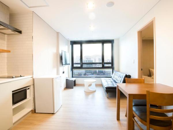 Grid Inn Hotel : photo 1 de la chambre studio familial